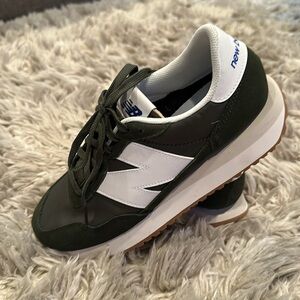 Brand new women’s NB olive green track shoes
